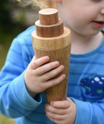 Cone and stacking discs from the Papoose Toys wooden tinker tray school set used to create a toy ice cream.