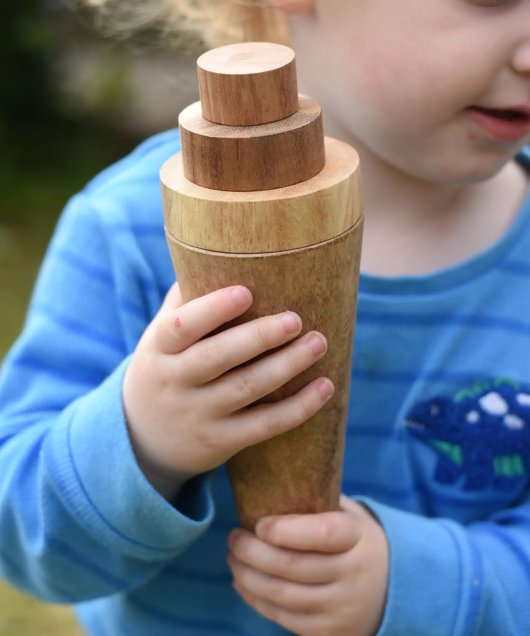 Cone and stacking discs from the Papoose Toys wooden tinker tray school set used to create a toy ice cream.