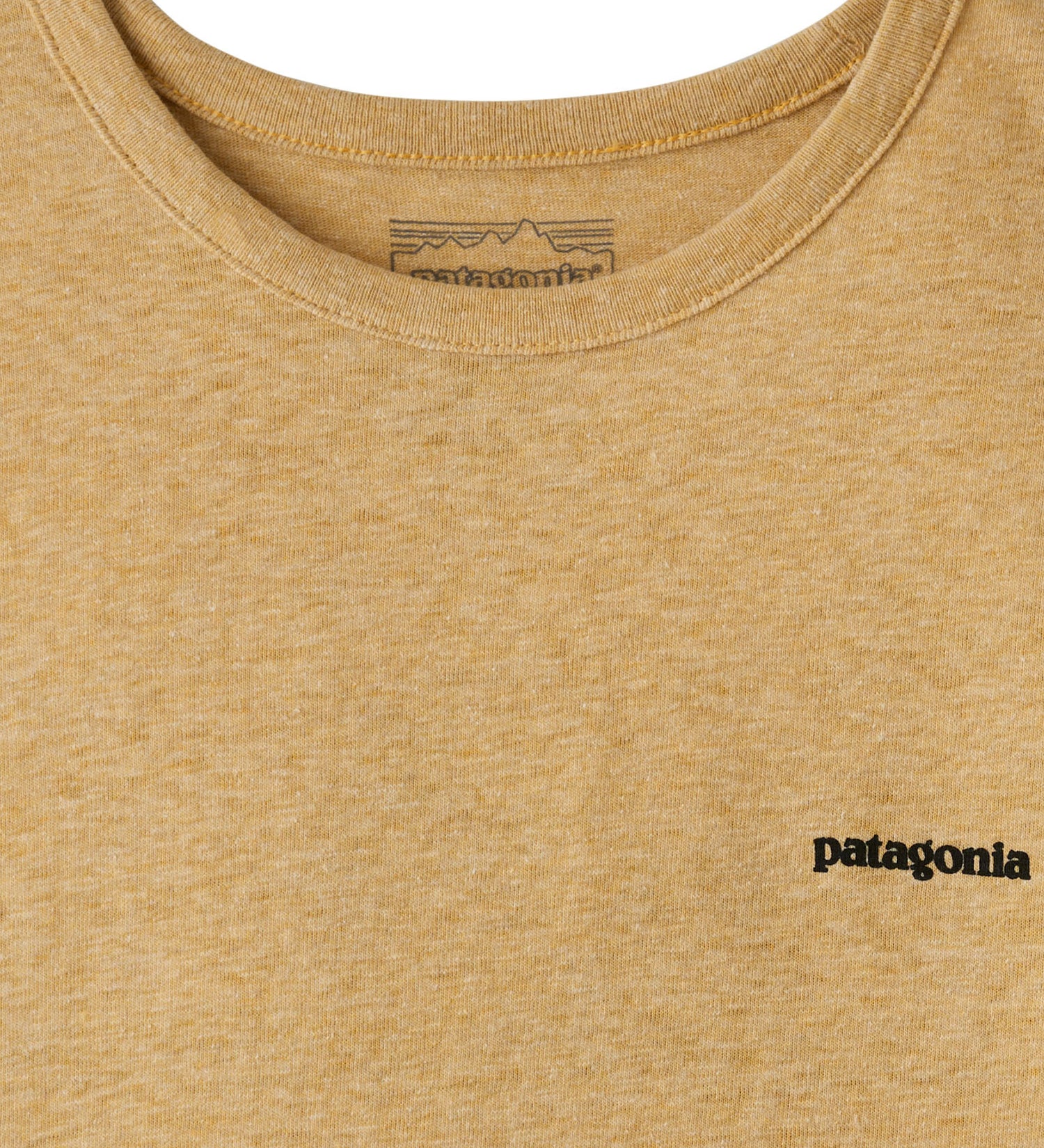 Patagonia yellow tan long sleeve top logo detail