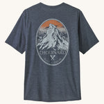 The Patagonia Men's Capilene Cool Daily Graphic Shirt - Chouinard Crest / Smolder Blue X-Dye on a plain background.