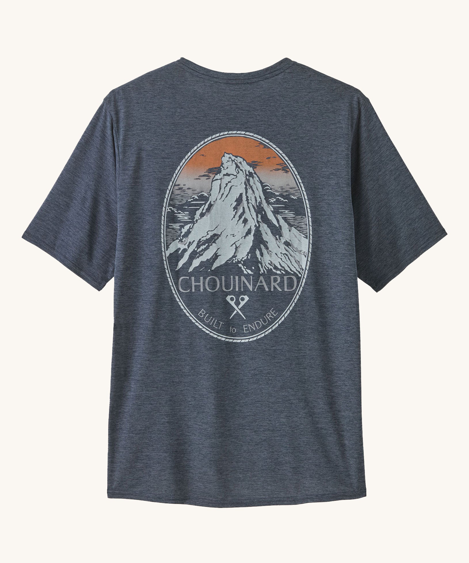The Patagonia Men's Capilene Cool Daily Graphic Shirt - Chouinard Crest / Smolder Blue X-Dye on a plain background.
