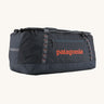 Patagonia 100 litres duffel bag in a navy blue colour on a cream background.