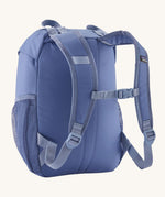 A reverse image of the The Patagonia Kids Refugito 12L Backpack  in current blue showing the padded shoulder straps and matching chest straw detail