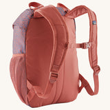 A reverse image of the The Patagonia Kids Refugito 12L Backpack  in sea run potters red showing the padded shoulder straps and matching chest straw detail