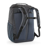 The back of the Patagonia refugito 18 litres daypack in ink black. showing the pastel blue padded shoulder pads with black detail and mesh side pockets on 100% recycled material 