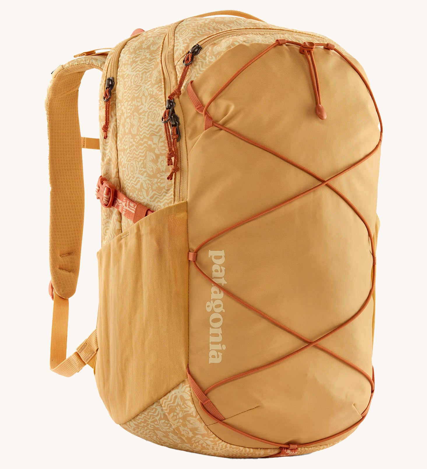 Patagonia 30L yellow refugio day backpack with a flower design on a cream background.