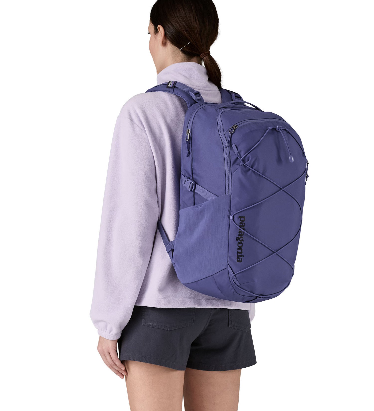 Patagonia 30L purple refugio day backpack worn by an adult