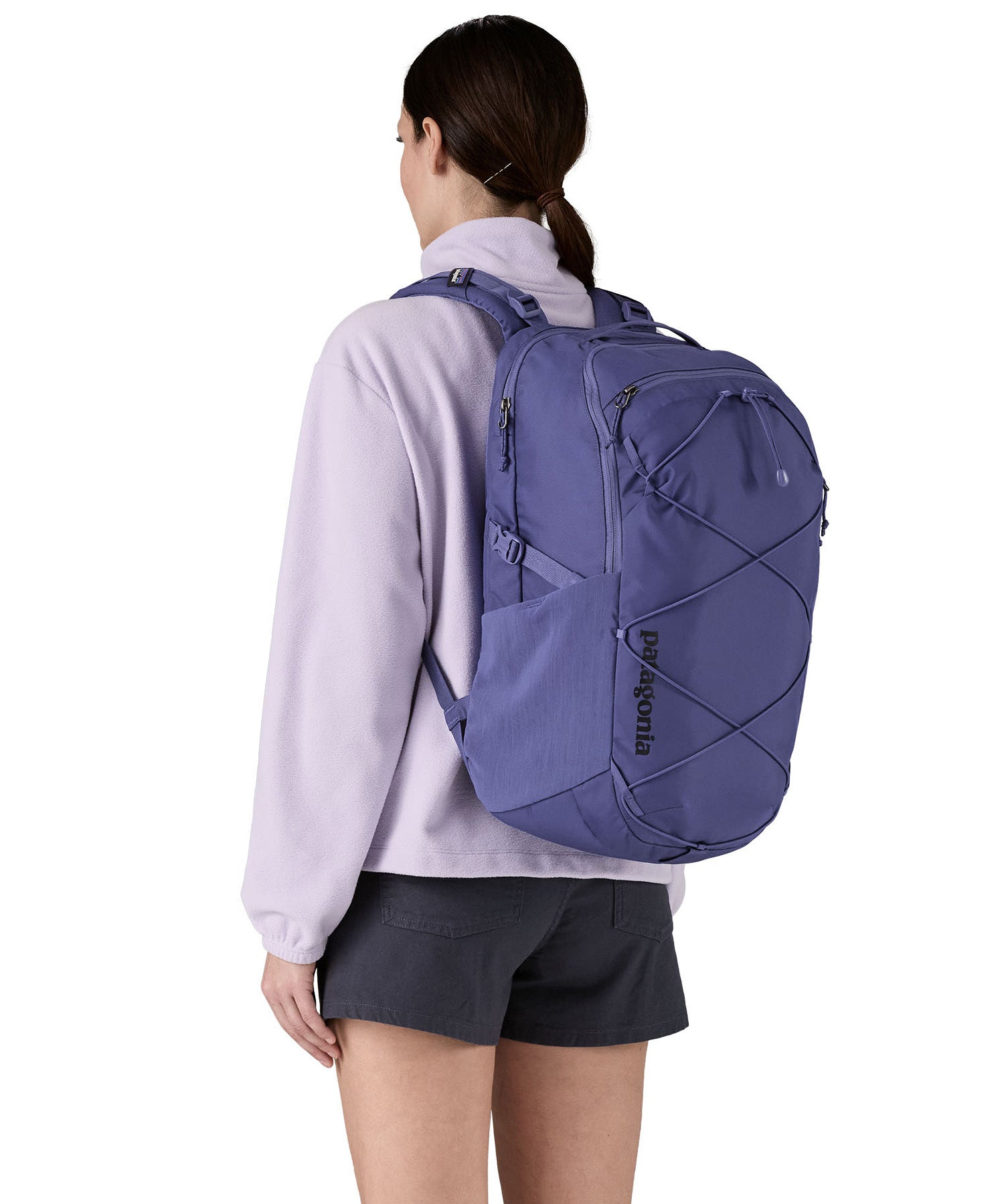 Patagonia 30L purple refugio day backpack worn by an adult