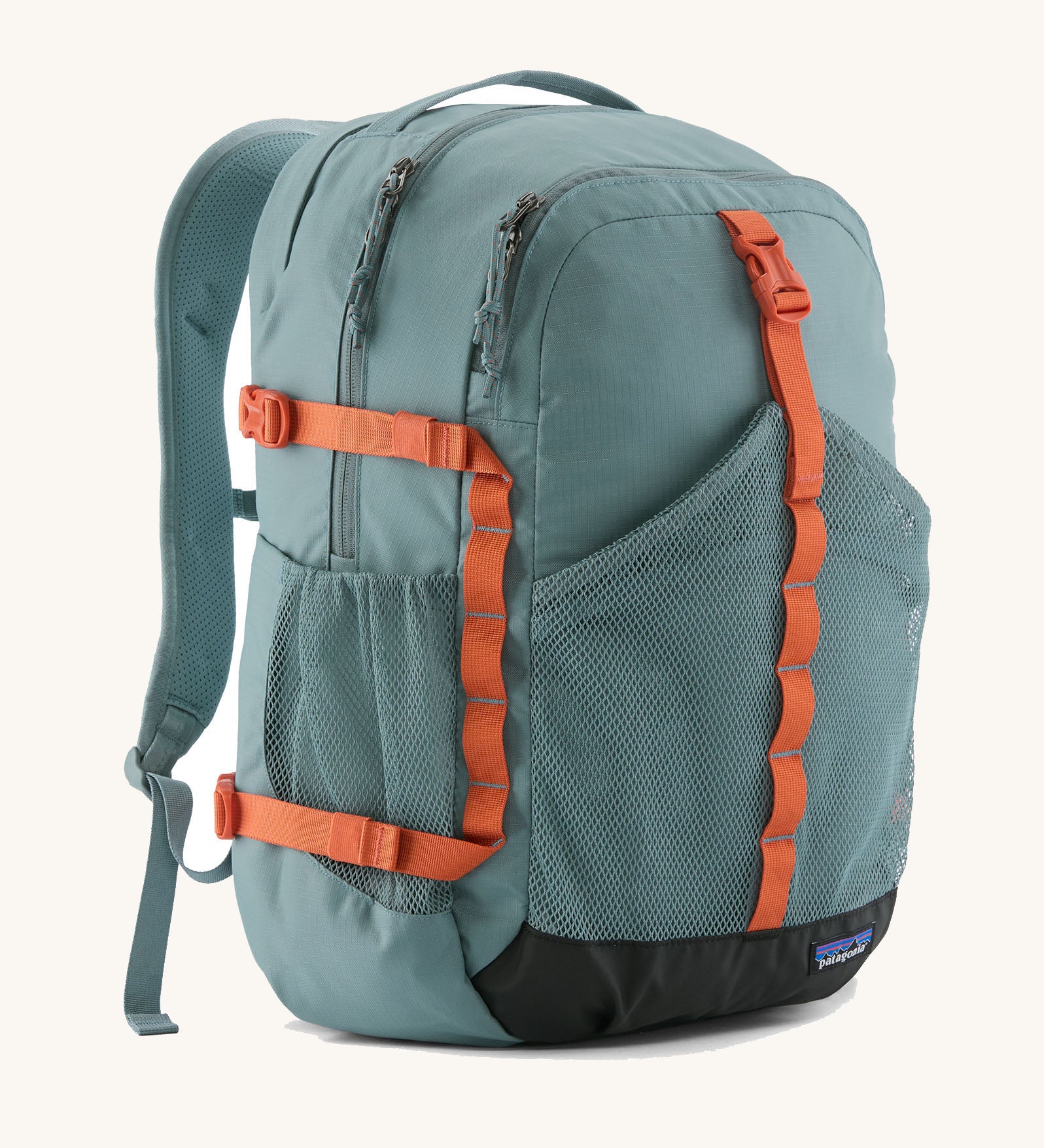 Patagonia 30L refugio backpack in blue sage with side bottle holder and orange gear loops and quick release buckles.