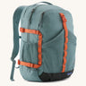 Patagonia 30L refugio backpack in blue sage with side bottle holder and orange gear loops and quick release buckles.
