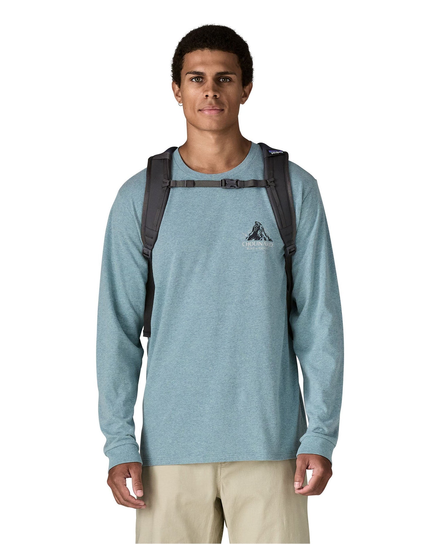 Patagonia 30L refugio backpack in smolder blue with black chest strap and quick release buckles.