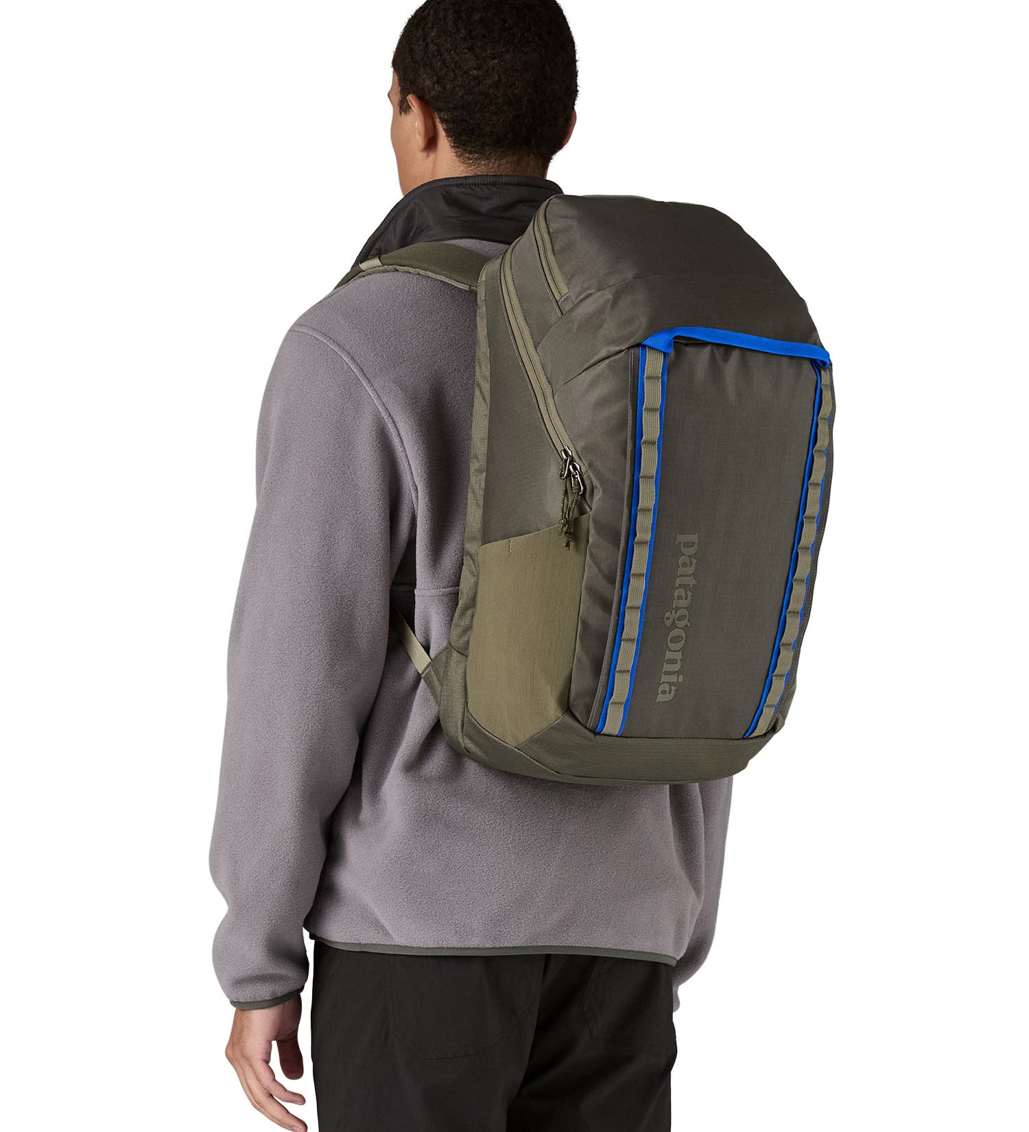 Patagonia 32L black hole backpack worn by an adult
