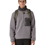 Patagonia 32L black hole backpack worn by an adult