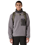Patagonia 32L black hole backpack worn by an adult