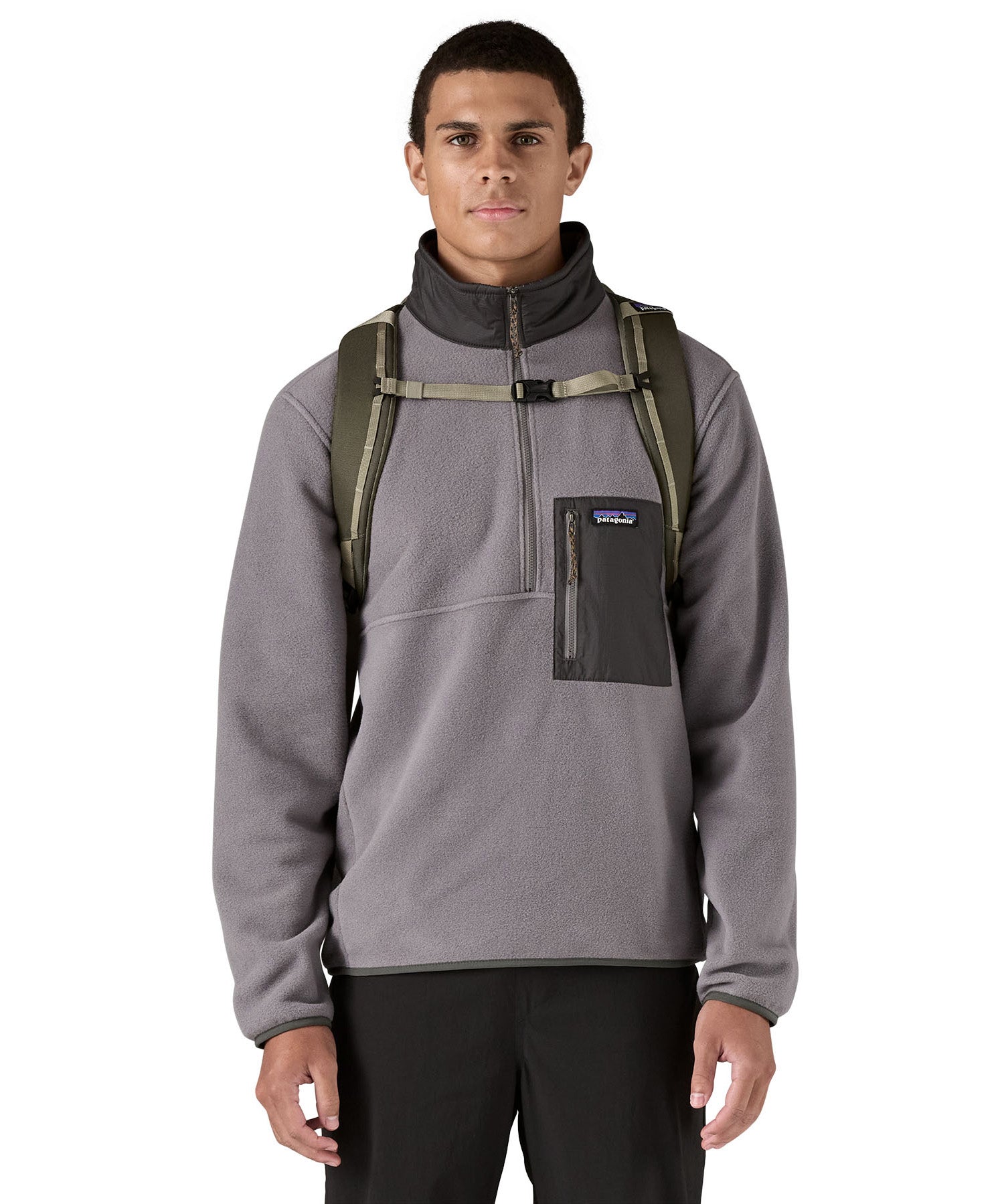 Patagonia 32L black hole backpack worn by an adult