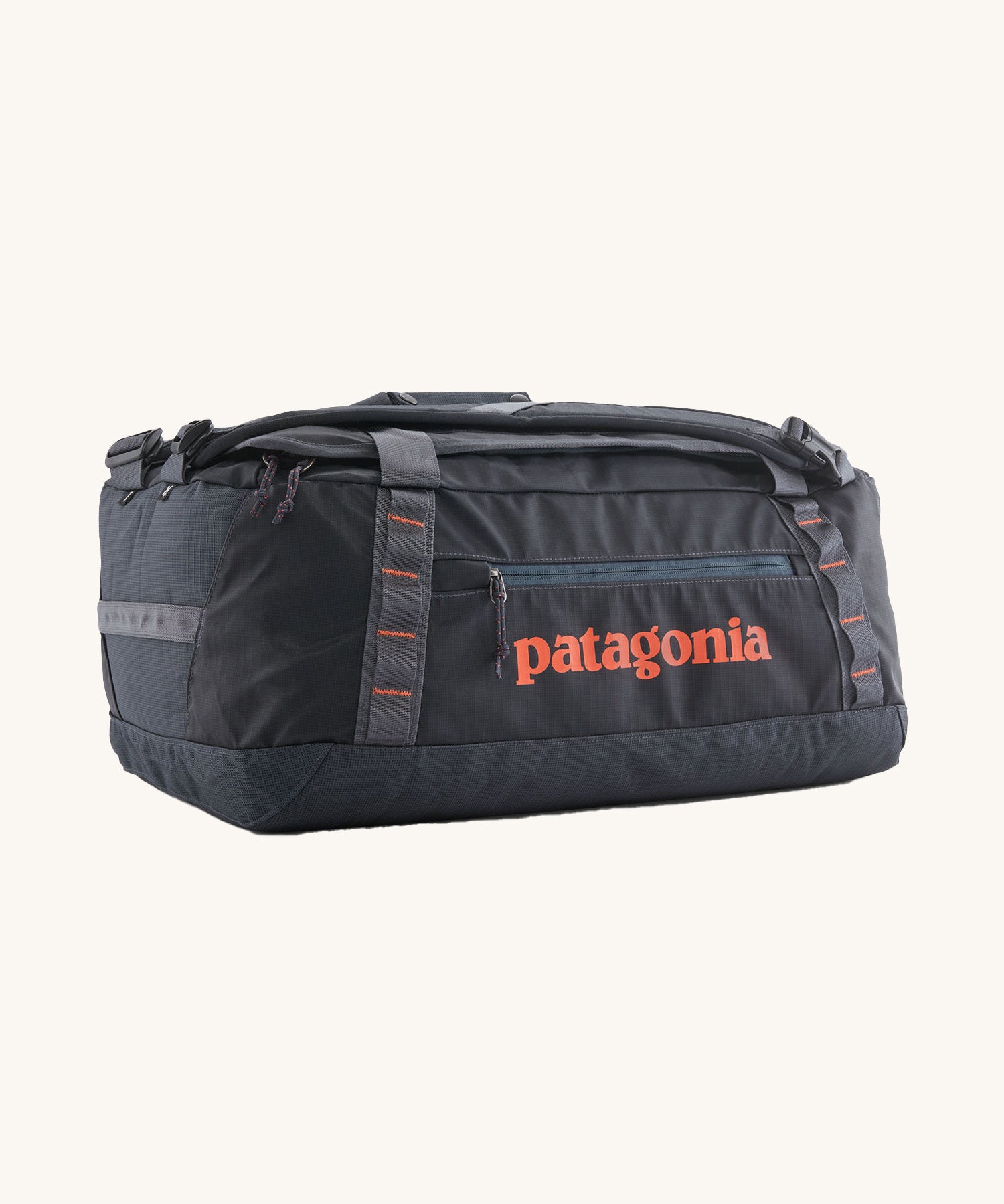 Patagonia 40 litres duffel bag in a dark navy blue colour on a cream background.