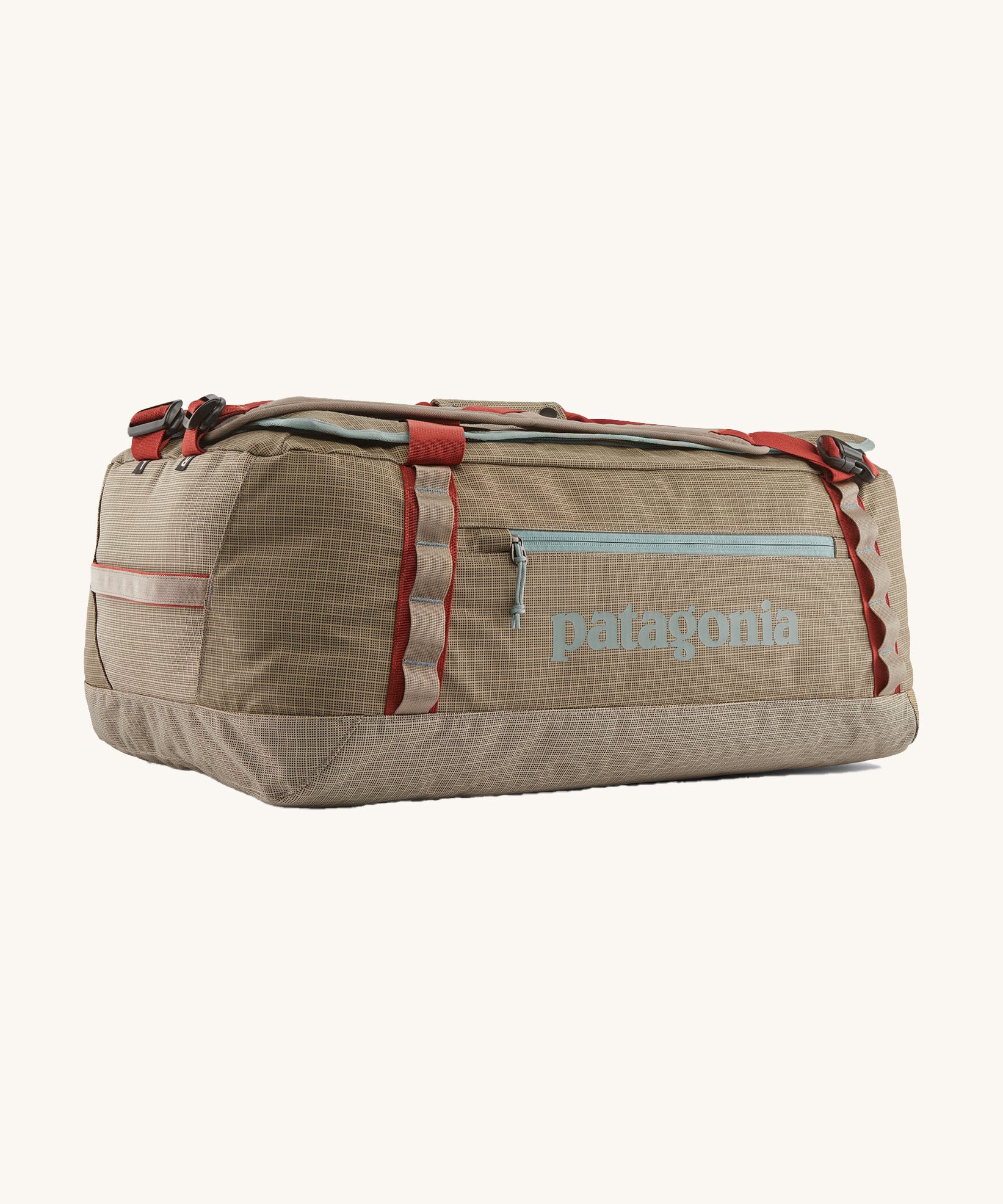 Patagonia 55 litres duffel bag in a seabird grey colour on a cream background.