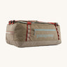 Patagonia 55 litres duffel bag in a seabird grey colour on a cream background.