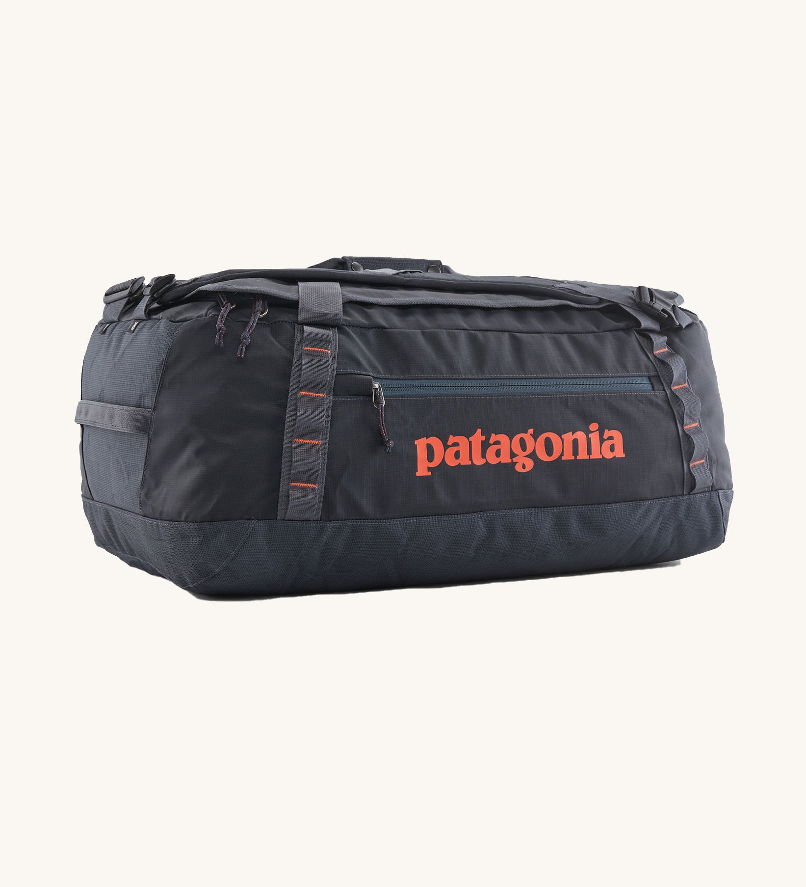 Patagonia 55 litres duffel bag in a navy blue colour on a cream background.