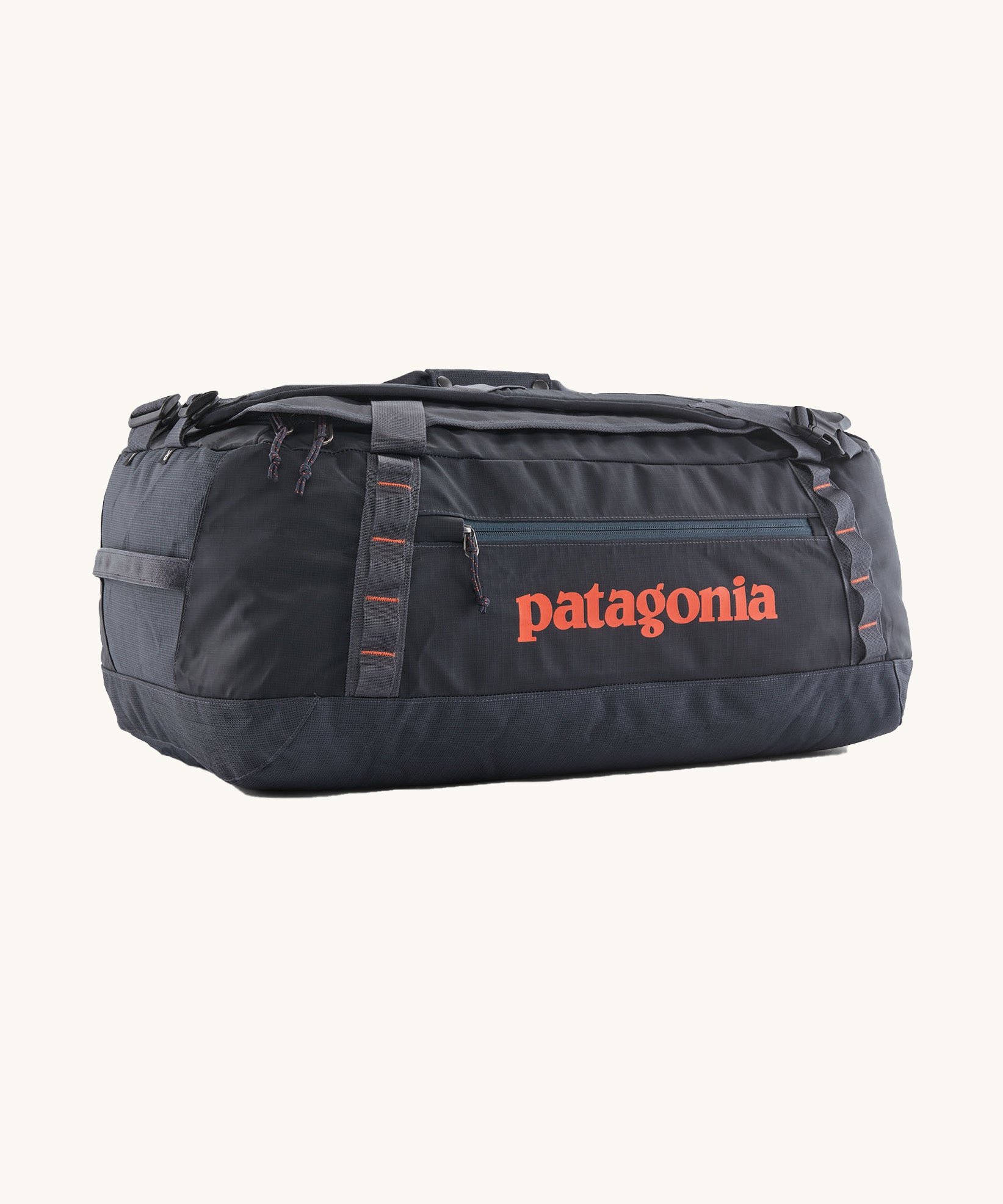 Patagonia 55 litres duffel bag in a navy blue colour on a cream background.