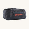 Patagonia 55 litres duffel bag in a navy blue colour on a cream background.