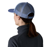 The back of a woman the Patagonia adult barnacle blue trucker hat available at Babipur
