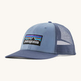 Patagonia adult barnacle blue hat. A trucker style cap with a low profile in blue and features a navy mesh back with a logo embroidery on the front panel