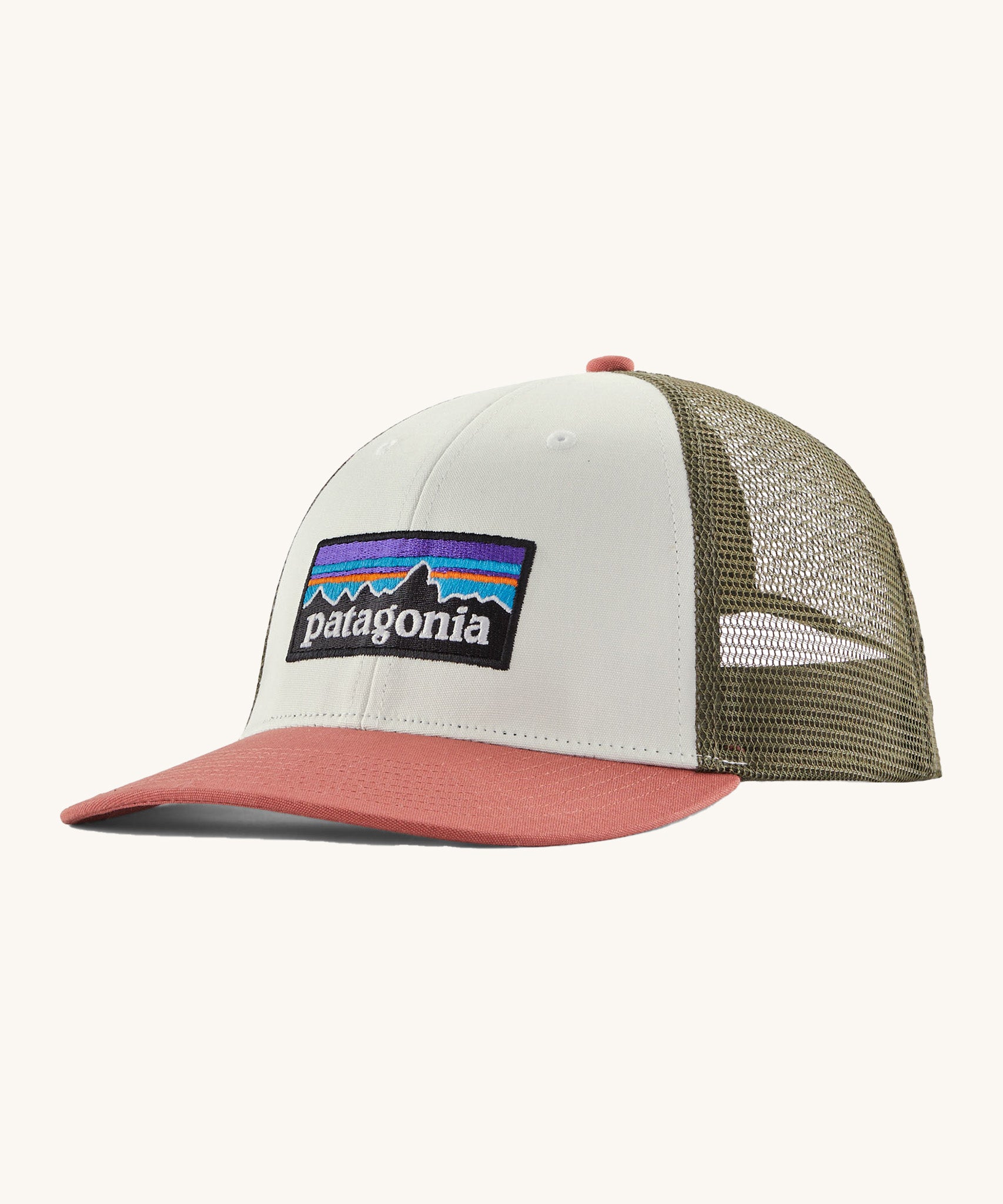 Patagonia adult birch white hat. A trucker style cap with a low profile in white colour and features a khaki mesh back with a coral brim and logo embroidery on the front panel