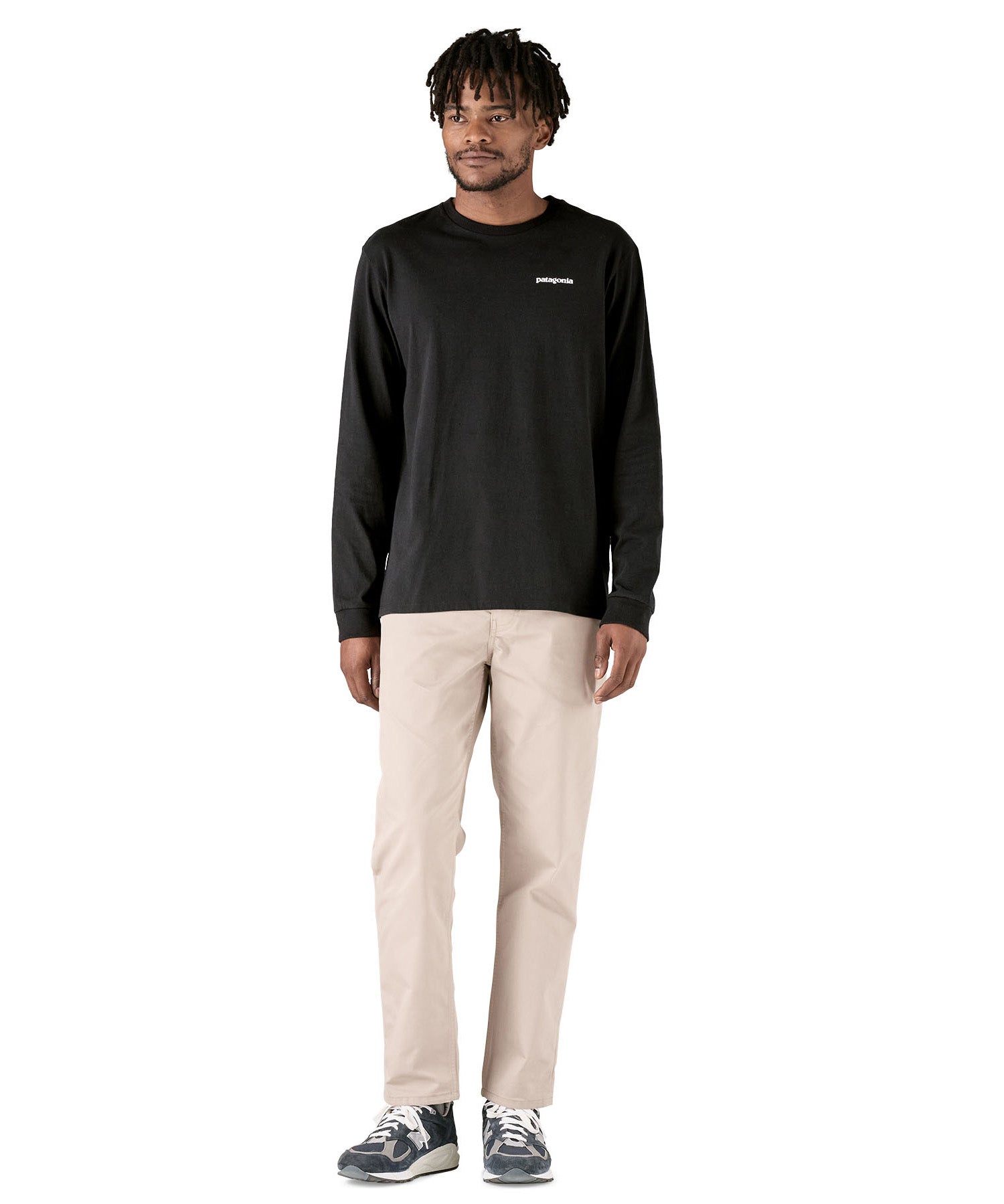 Full view of the black cotton Patagonia Adult  L/S P-6 Logo Responsibili-Tee worn by an adult