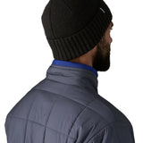 Back of a man wearing the Patagonia brodeo wool blend unisex beanie in black.