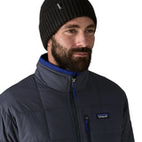 Man wearing the Patagonia brodeo wool blend unisex beanie in black.