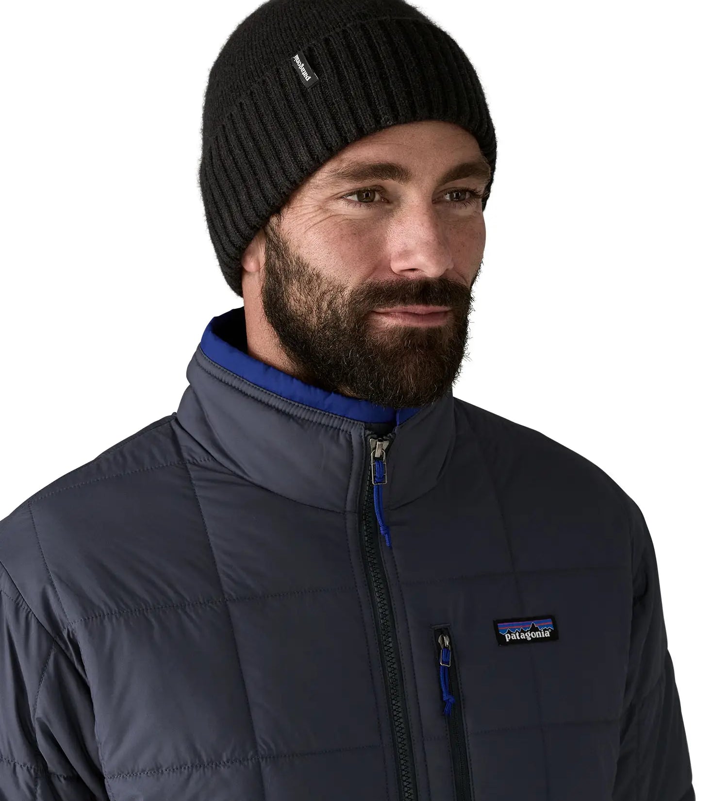 Man wearing the Patagonia brodeo wool blend unisex beanie in black.