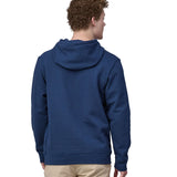 A man wearing the Patagonia Adult Fitz Roy Icon Uprisal Hoody Lagom Blue showing the back