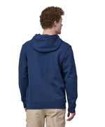 A man wearing the Patagonia Adult Fitz Roy Icon Uprisal Hoody Lagom Blue showing the back