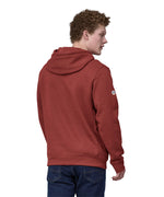 A man wearing a Patagonia Adult Fitz Roy Icon Uprisal Hoody Mangrove Red