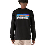 Rear view of the the black cotton Patagonia Adult  L/S P-6 Logo Responsibili-Tee, worn by an adult