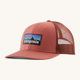 Patagonia adult red potters hat. A trucker style cap with a mesh back and logo embroidery on the front panel