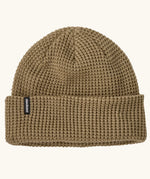 Patagonia unisex adult snowdrifter beanie in weathered stone.