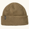Patagonia unisex adult snowdrifter beanie in weathered stone.