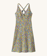 Patagonia women's amber dawn dress in blue with floral pattern on a cream background