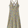 Patagonia women's amber dawn dress in blue with floral pattern on a cream background