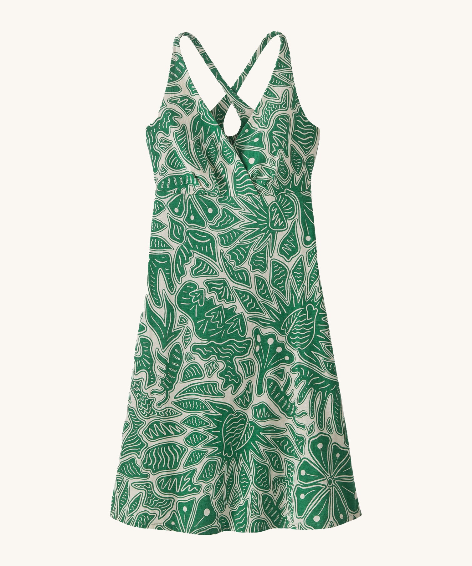Patagonia women's amber dawn dress with retro green leaves design on a cream background.
