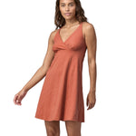 Patagonia women's amber dawn dress 
in light red colour worn by a woman front detail