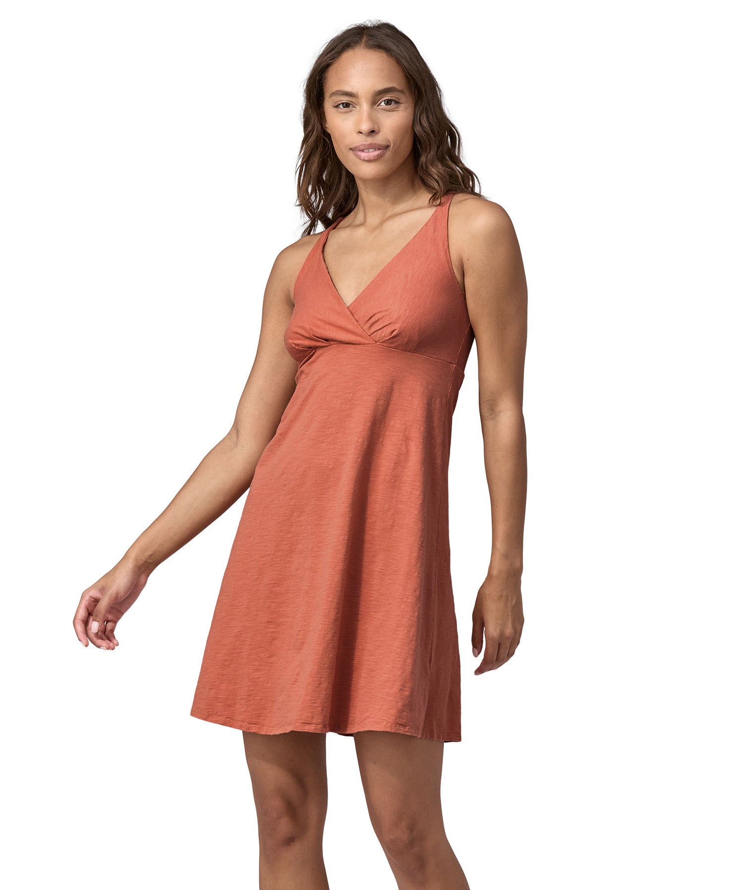 Patagonia women's amber dawn dress 
in light red colour worn by a woman front detail