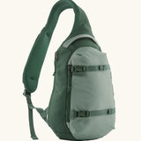 Patagonia atom sling 8L bag in cover green. Over the shoulder strap with zipped compartments and equipment straps on the front.