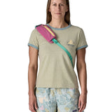 Person wearing the Patagonia atom crossbody 8L sling bag in faded magenta with a zipped compartment on the strap. 