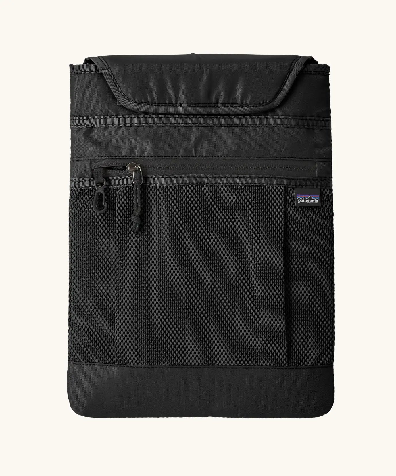 The padded 13 inch laptop sleeve included with the Patagonia atom 20 litre black tote bag backpack.