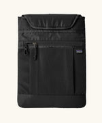 The padded 13 inch laptop sleeve included with the Patagonia atom 20 litre black tote bag backpack.