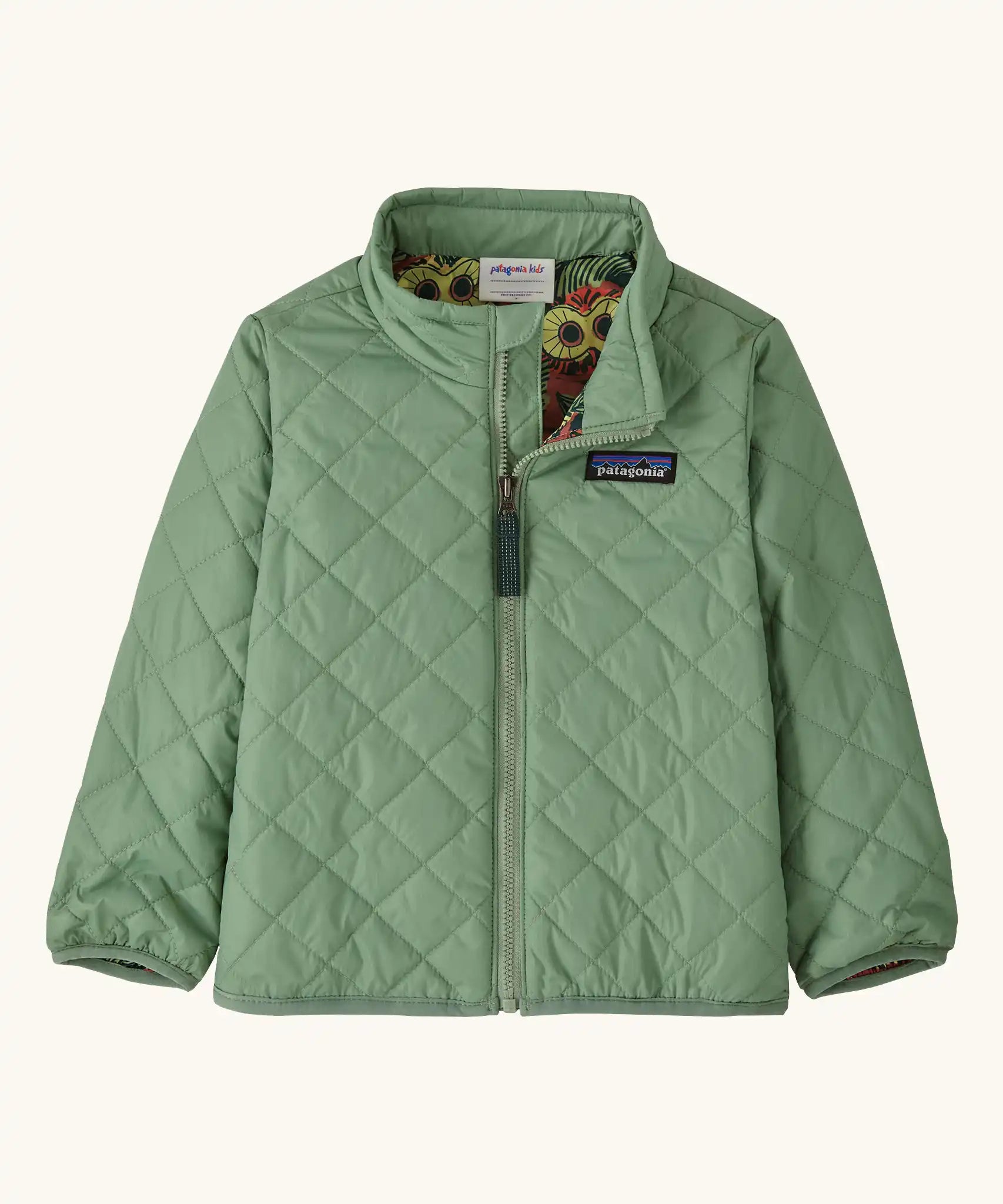 Patagonia Little Kids Nano Puff® Insulated Jacket Elwood Green, lightweight quilted baby jacket with zip and Patagonia chest logo.