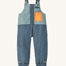 The Patagonia Baby Snow Pile Bibs in a  Thermal Blue colour on a plain background.